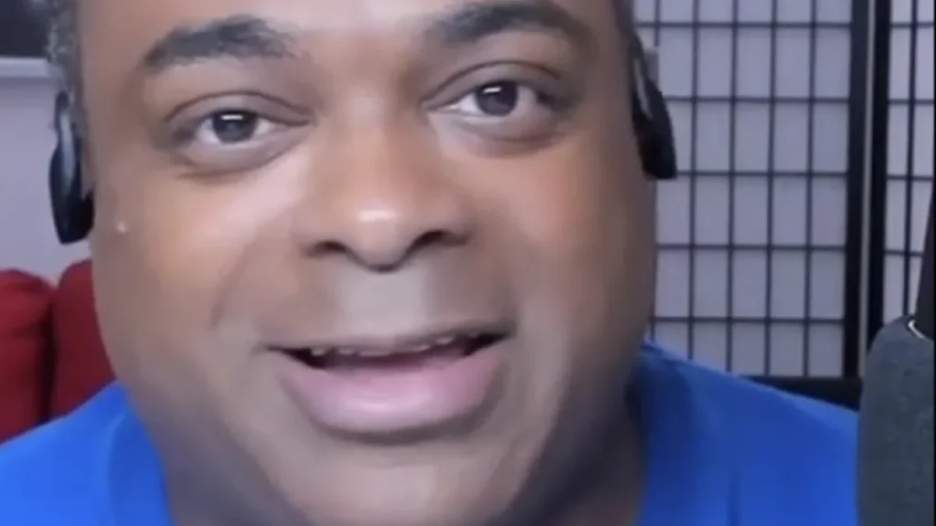 Lamarr Wilson, wearing headphones and a blue shirt, photographed during a video broadcast in January 2020.