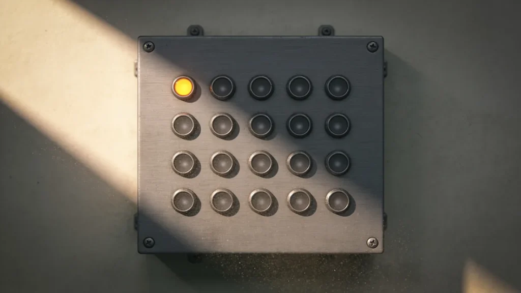 One indicator lamp lit warm amber among a grid of identical unlit lamps on a brushed steel industrial control panel, in a narrow band of natural daylight. AI-generated conceptual illustration, not a photograph of any real system.
